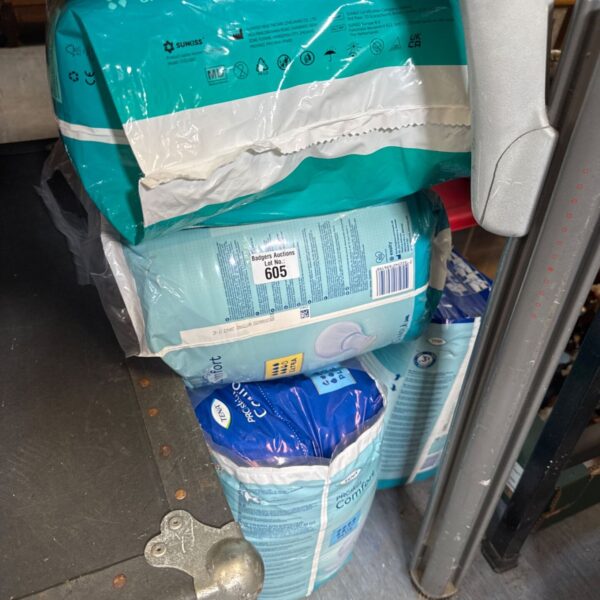 Sealed packs of Tena Proskin Plus size M incontinence pads.