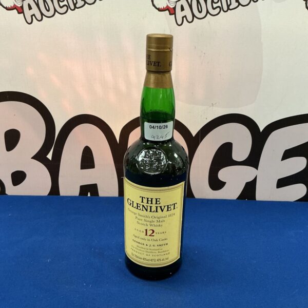 Vintage bottle of The Glenlivet Scotch Whisky for collectors.