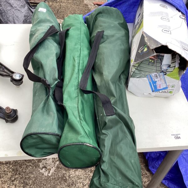 Bundled camping chairs ready for outdoor adventures.