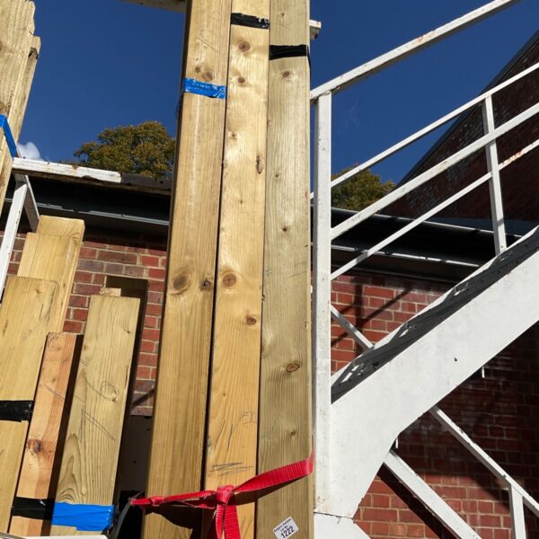 Three bundles of 10’6” timber secured with blue strapping.