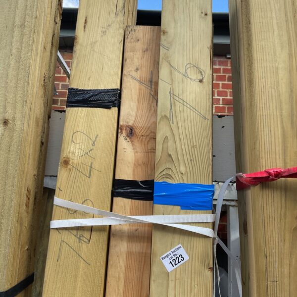 Three bundles of 7’6” timber secured with plastic strapping.