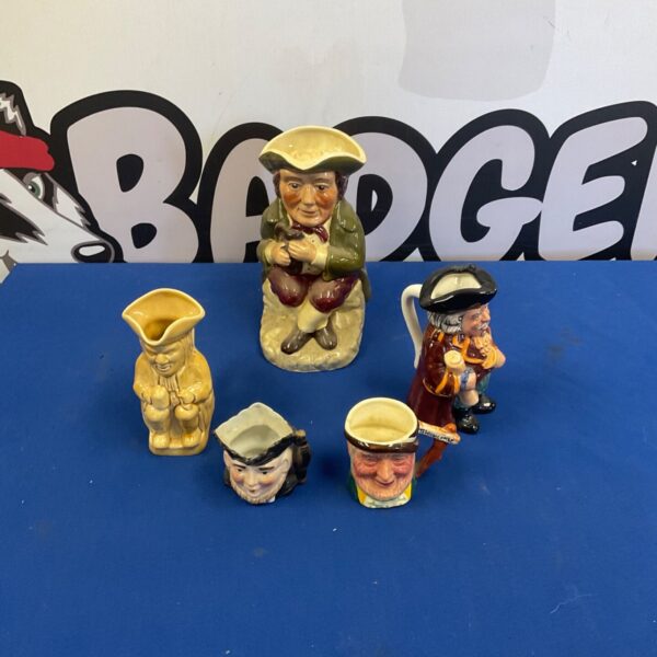 Collection of five Toby jugs in varied glazes and character designs