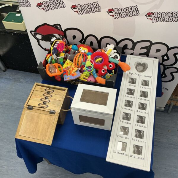 Mixed lot of toddler toys with wooden storage boxes and a photo frame.