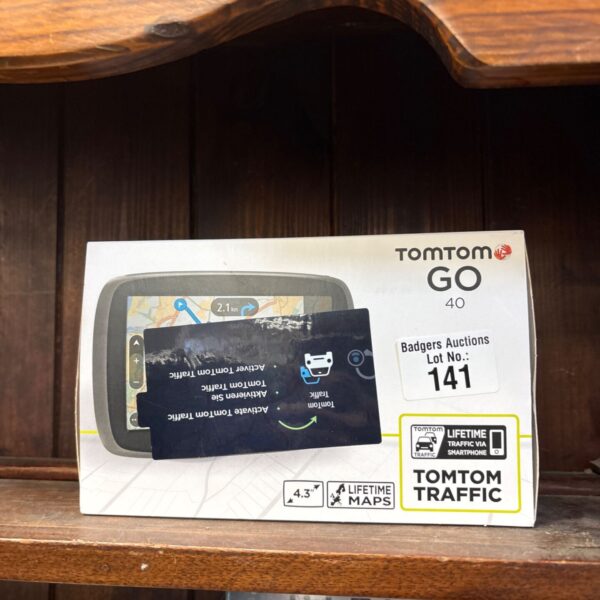 TomTom GO 40 GPS navigation system in its original box.