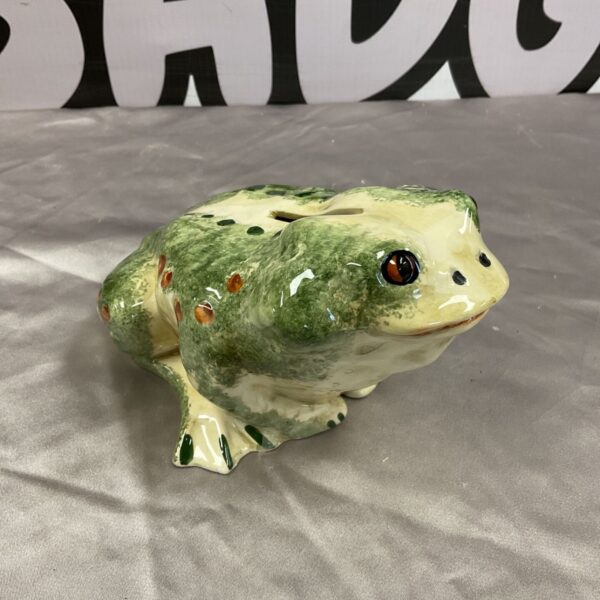 Toni Raymond hand painted pottery frog money box in green glaze with orange spots