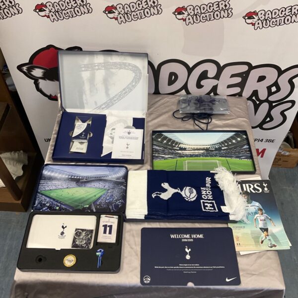 Tottenham Hotspur memorabilia collection with scarf, stadium prints, keyrings and welcome card