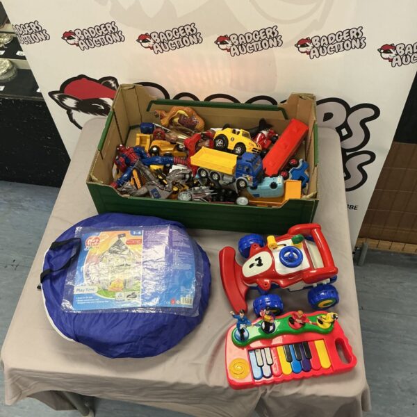 Full view of a toy bundle with a play tent and diecast cars.