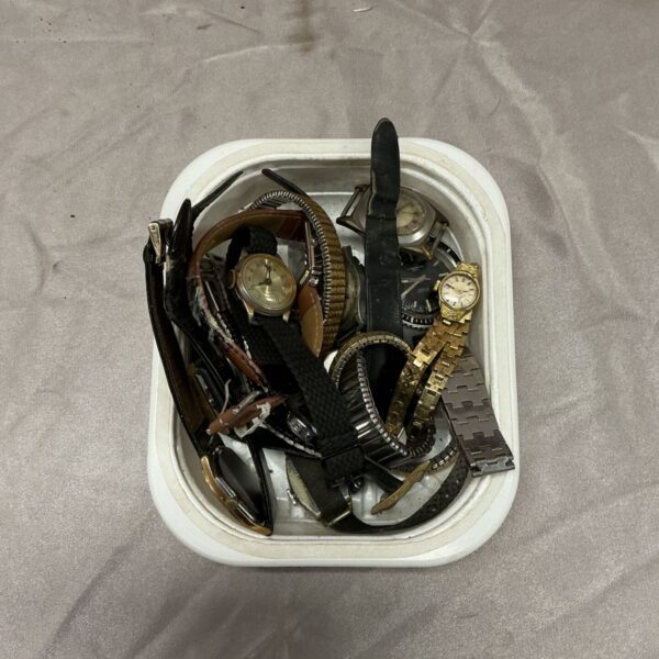 Tray of assorted wristwatches with leather, textile and metal bracelet straps