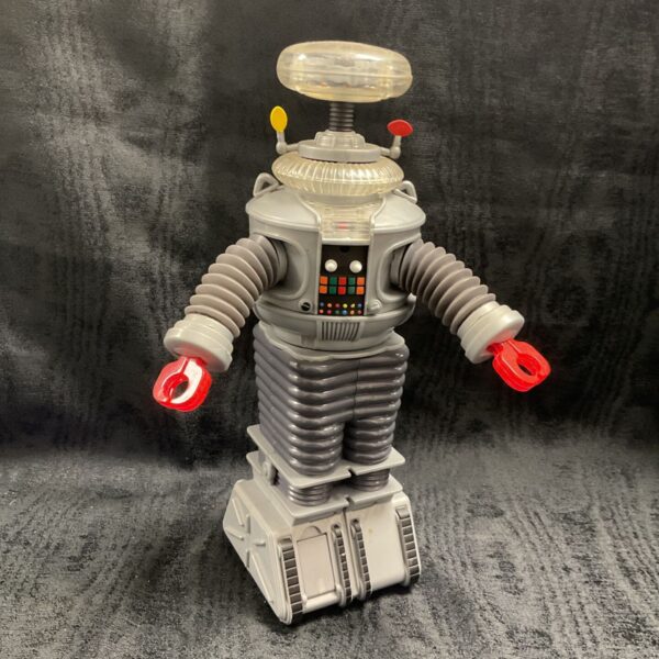 Front view of Trendmasters Robbie the Robot 1997 toy with clear dome head.