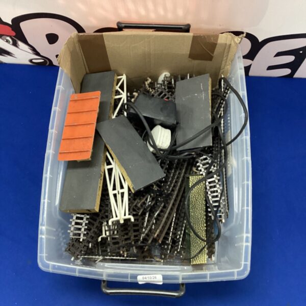 Vintage Triang model railway track and station scenery in a box.