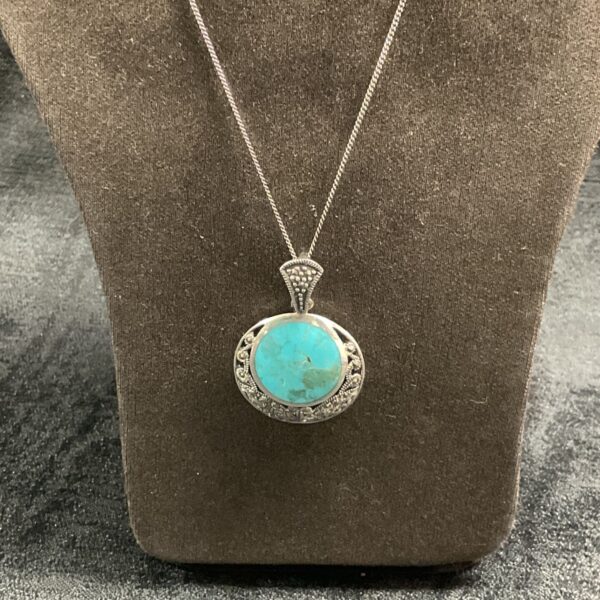 Bright blue turquoise necklace with 925 silver chain.
