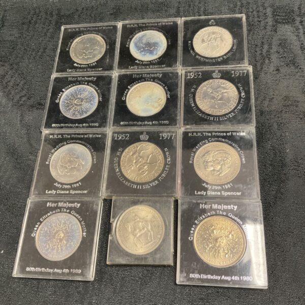 Twelve royal commemorative crown coins in clear plastic cases, Diana, Queen Mother and Jubilee