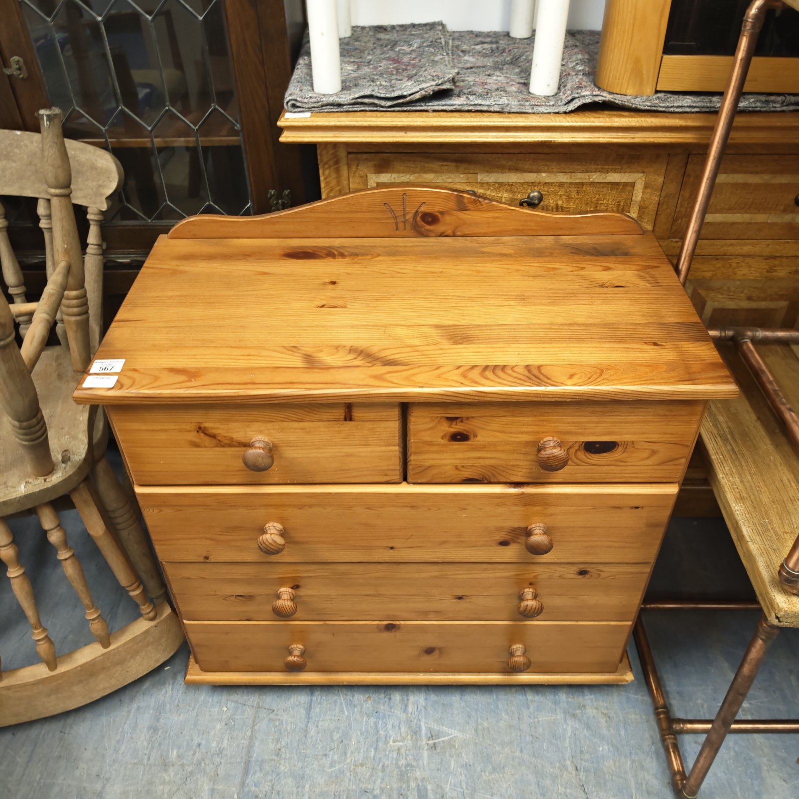 Two over three pine chest of drawers with turned wooden knobs