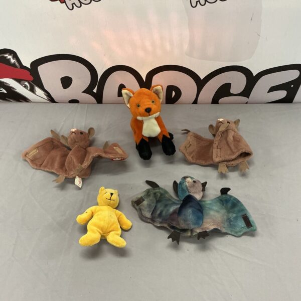 TY Beanie Babies lot featuring a bat, fox, and bear plush toy.