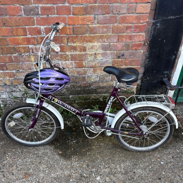 Purple Universal Stowaway 3 folding bike, vintage city bicycle.