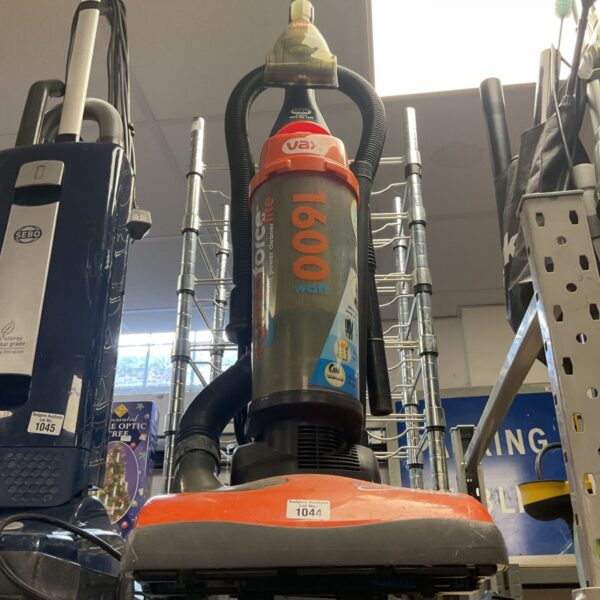 Orange and grey Vax Turbo Force Lite 1600 watt upright vacuum cleaner with lot label