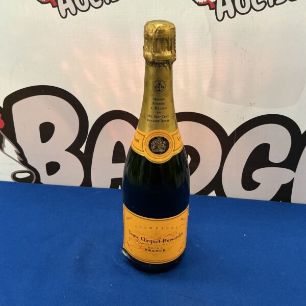 Vintage Veuve Clicquot Champagne bottle with iconic label.