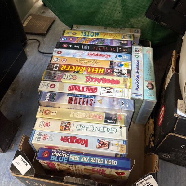 Collection of vintage VHS movie tapes for collectors.