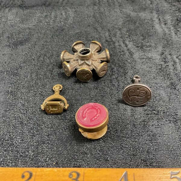 Victorian eight motto multi wheel seal with carnelian letter seal and two fob seals