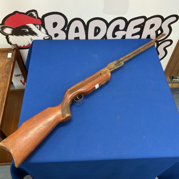 Vintage air rifle side view, a classic airgun for restoration.