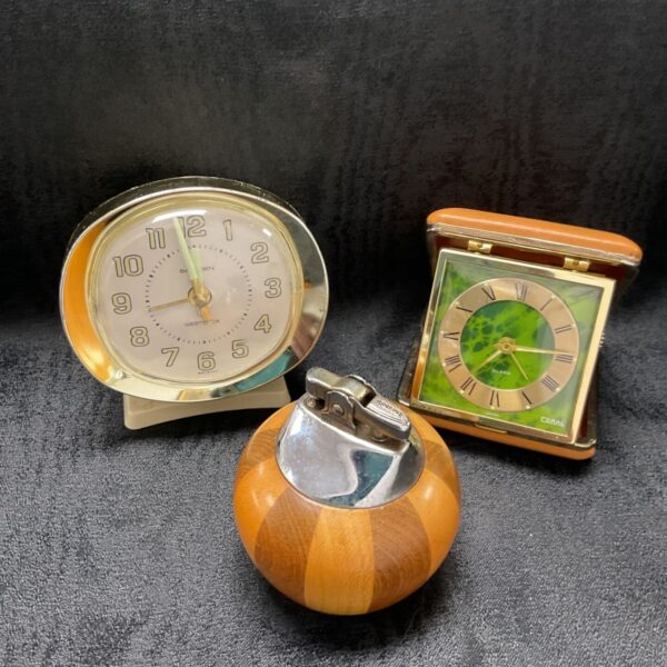 Vintage alarm clocks and Ronson lighter lot for collectors.