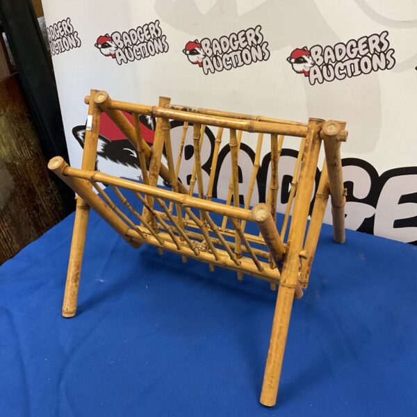 Vintage bamboo magazine rack, a stylish retro storage solution.