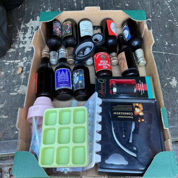 Mixed lot of vintage beer bottles and a professional corkscrew.