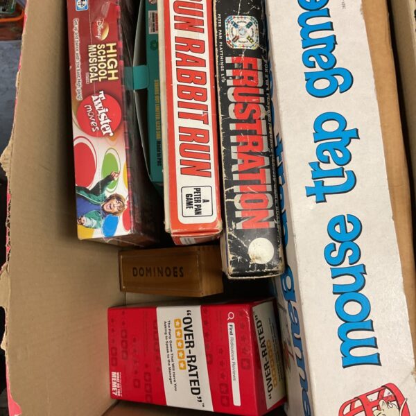 Lot of vintage board games including Mousetrap and Disney High School Musical.