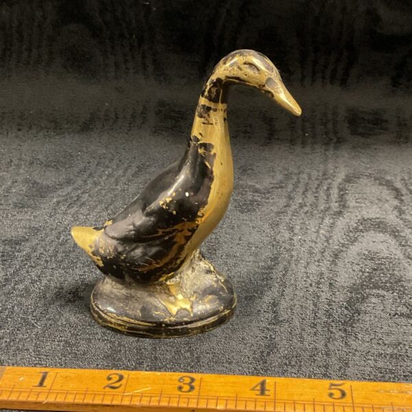 Vintage cold painted brass duck figurine, detailed and collectible.