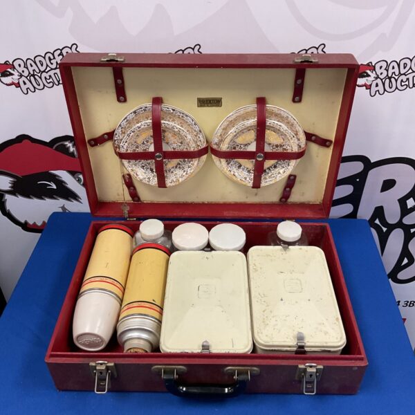 Vintage Brexton picnic set with thermos flasks and enamelware.