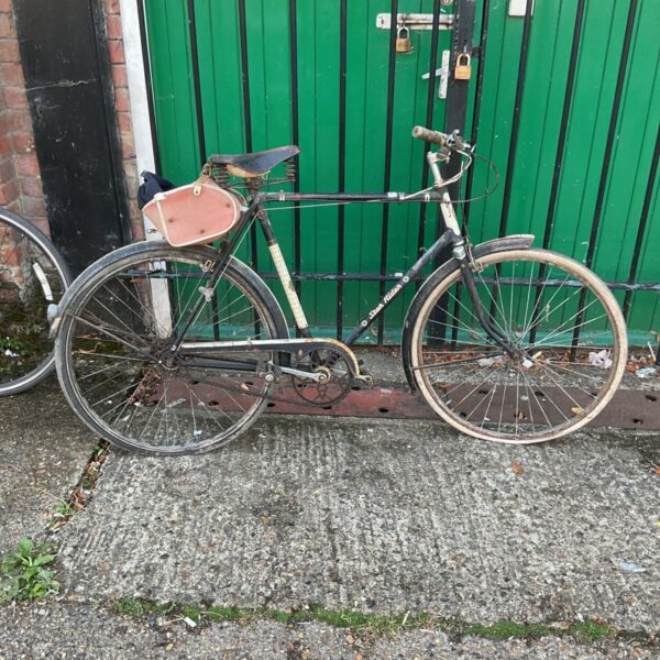 Vintage BSA Star Rider bicycle with front luggage carrier.