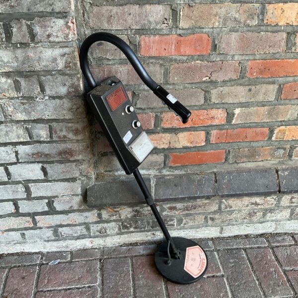 Vintage C-Scope metal detector with black control housing and search coil