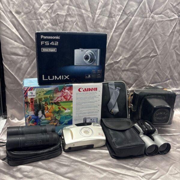 Vintage camera bundle featuring Panasonic Lumix, Canon, and Vivitar binoculars.