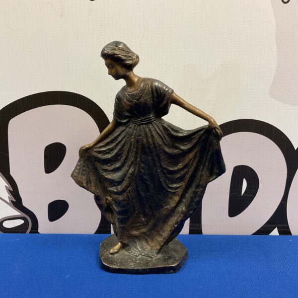 Vintage cast bronze figure of a dancing girl holding her flowing gown