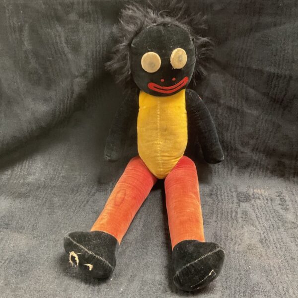 Vintage Chad Valley Golly soft toy seated with black fur-style hair and yellow torso