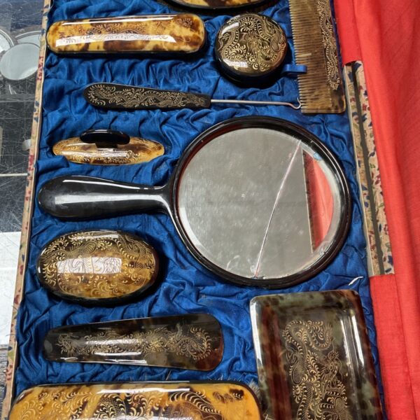 Vintage Chinese faux tortoiseshell vanity set with gilt dragon motifs in blue silk case