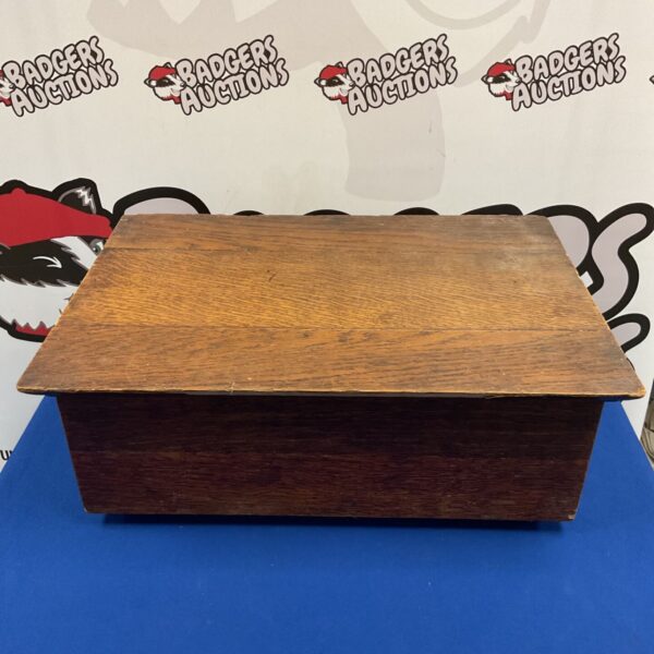 Vintage wooden church bible box with closed lid and grained oak finish