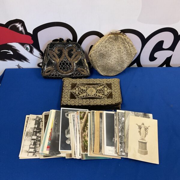 Vintage ladies clutch bags and postcards, a collectible fashion lot.