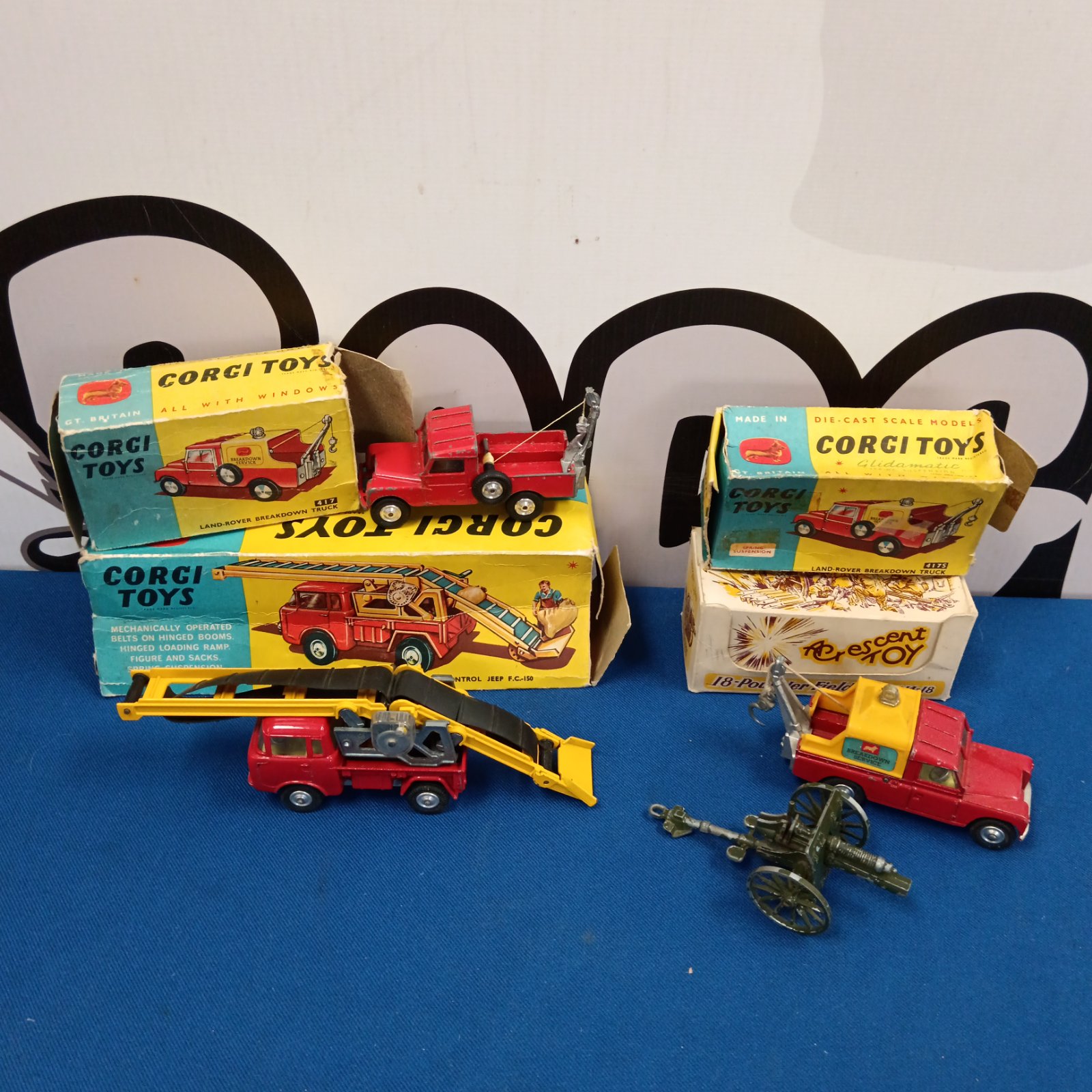 Vintage Corgi toys lot including Land Rover and Crescent field gun.
