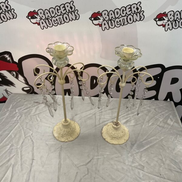 Pair of vintage cream metal candlesticks with glass sconces and crystal drops