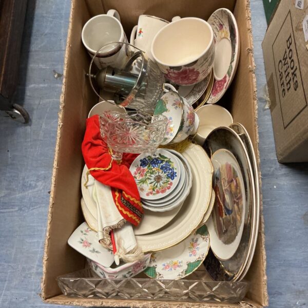 Box of vintage crockery and china with floral teacups, plates and cut glass
