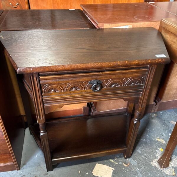 Vintage dark oak side table with carved drawer and lower shelf