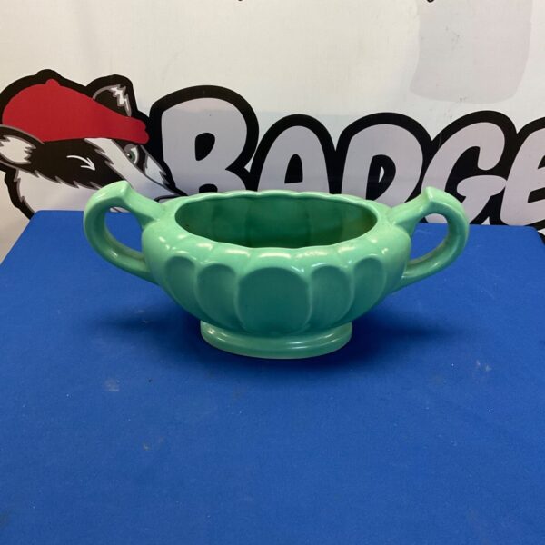 Vintage Dee Cee stoneware vase with a pale green glaze.