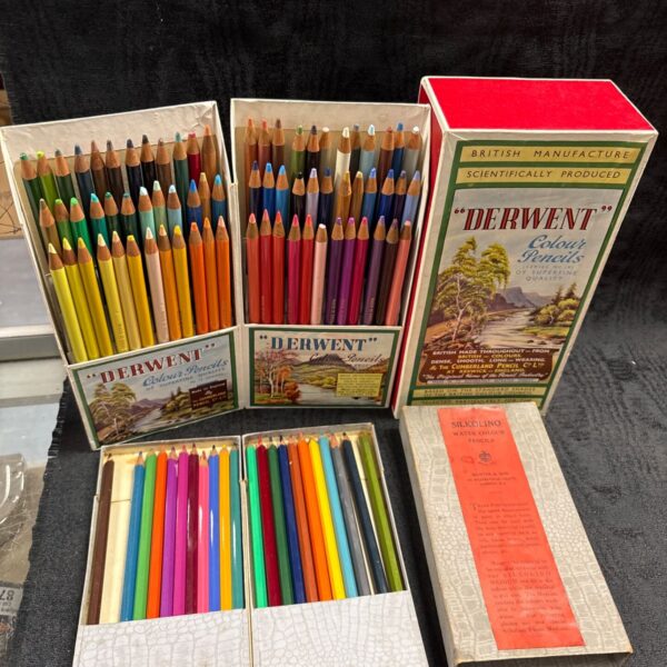 Vintage Derwent and Silkolino colour pencils arranged in original boxes
