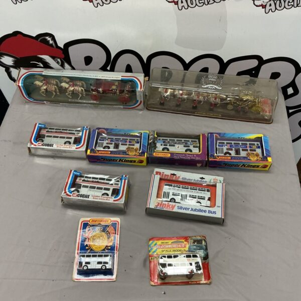 Vintage diecast model buses including Matchbox and Corgi SuperKings.
