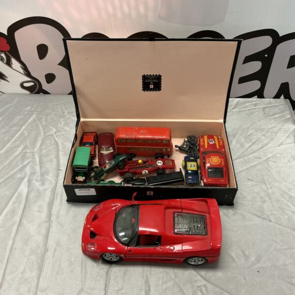 Vintage diecast and toy car collection with Maisto Ferrari and boxed model cars