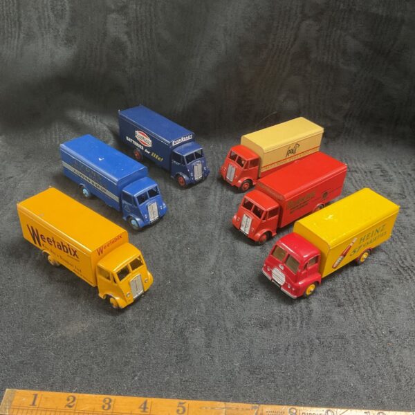 Six vintage Dinky advertising lorries in yellow, blue, red and cream liveries