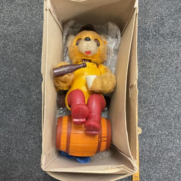Vintage battery operated drinking bear in original box.