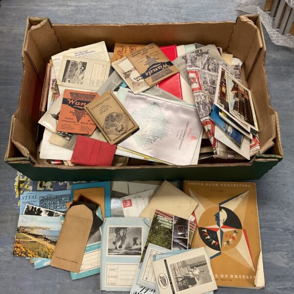 Tray of mixed vintage ephemera with postcards and printed leaflets