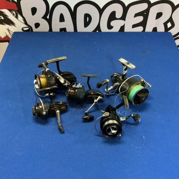 Vintage lot of fixed spool fishing reels including Mitchell and Intrepid.